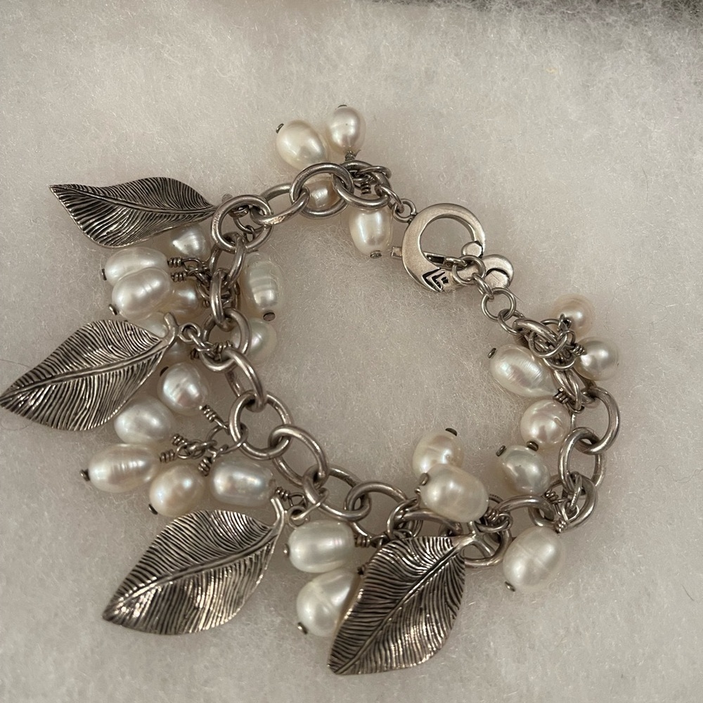 Genuine Silpada bracelet With real pearls and sterling silver leaves. Never worn